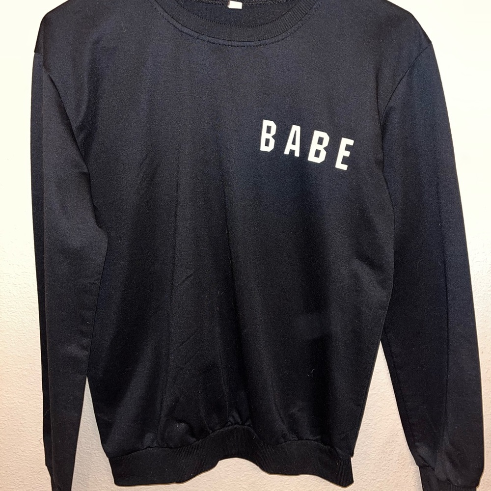 Black long sleeve shirt (not sure what brand)